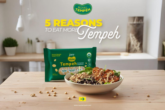 Royal Tempeh package displayed beside a bowl of tempeh salad with quinoa, black beans, and dressing on a wooden table with text saying '5 Reasons to Eat More Tempeh'.