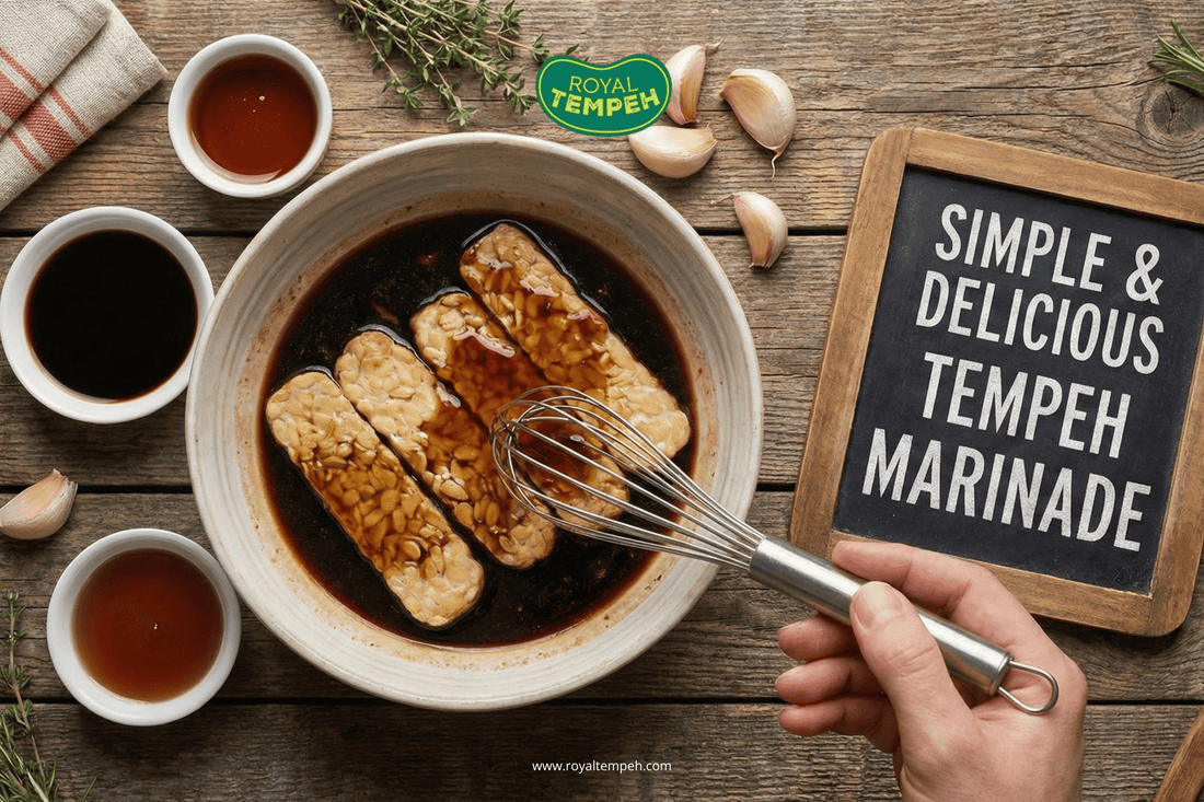 Tempeh slices soaking in a dark marinade bowl with a hand whisking the sauce.