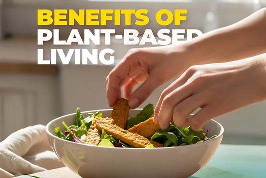Hands placing slices of tempeh onto a bowl of fresh mixed greens with text reading 'Benefits of Plant-Based Living' in bold yellow and white letters above.