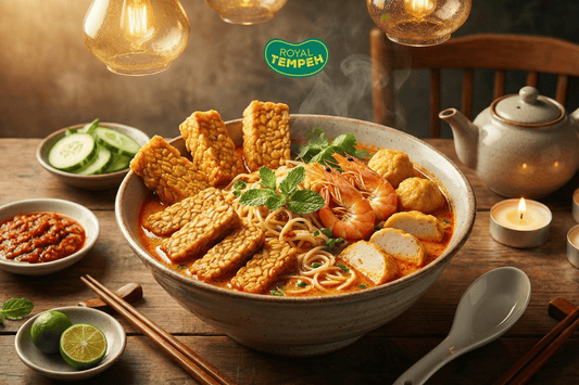 Spicy noodle soup topped with Royal Tempeh, shrimp, tofu, and fresh herbs.